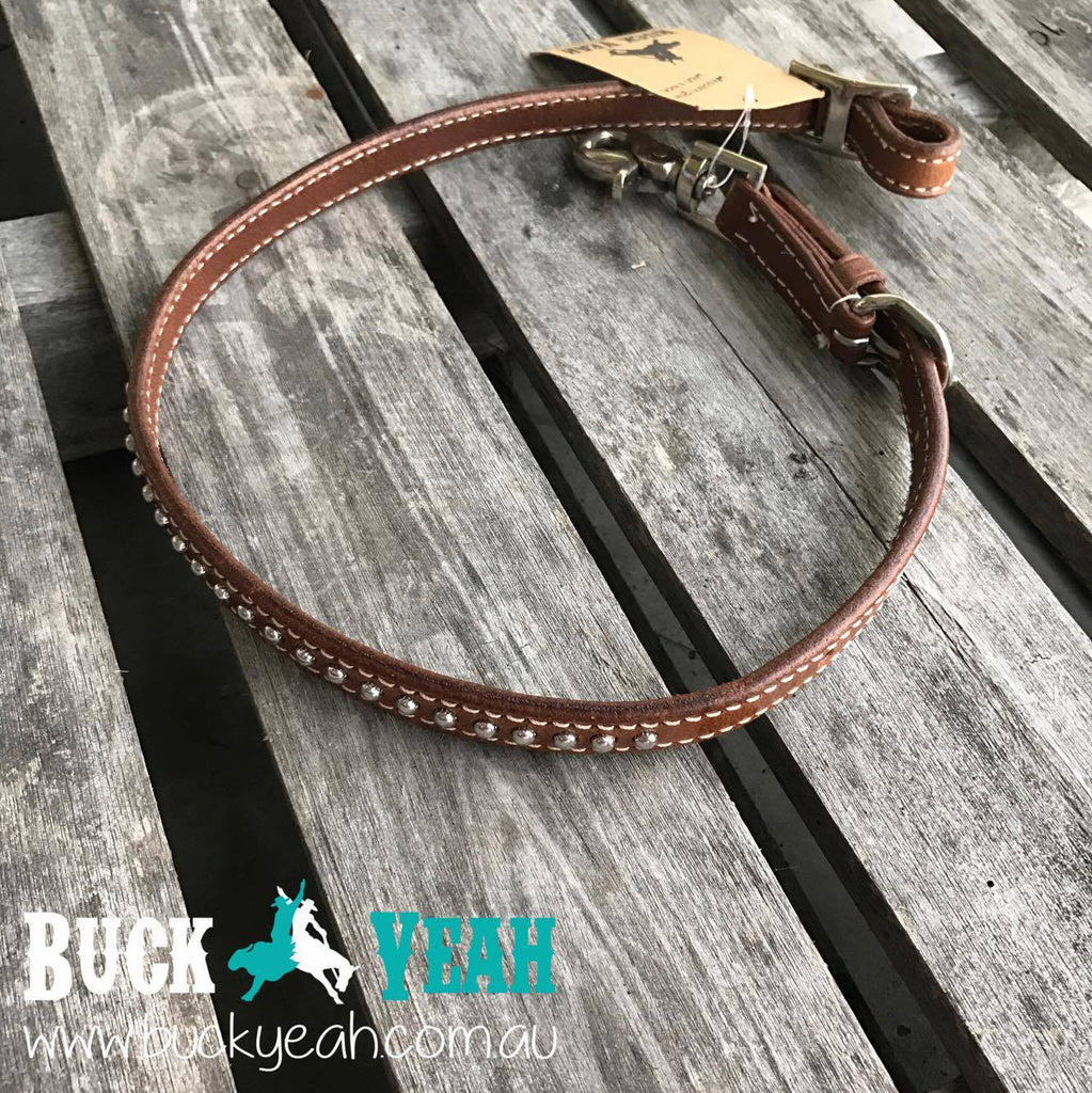 Leather wither strap with scissor snap end.