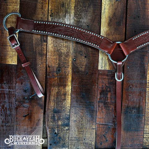 Leather breastcollar with floral tooling accented with silver studs